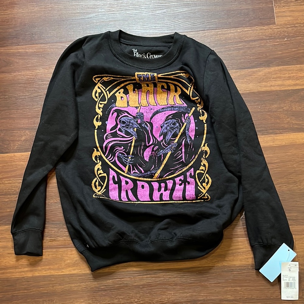 The black crowes, womens crew neck black sweater with the black crowes on front